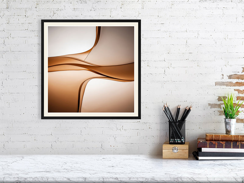 Golden Lumina - Sepia Flow by Lucas Vale – Giclée Print, 50cm x 50cm, 19.7in x 19.7in, Print Only, placed above a sleek desk in a modern workspace