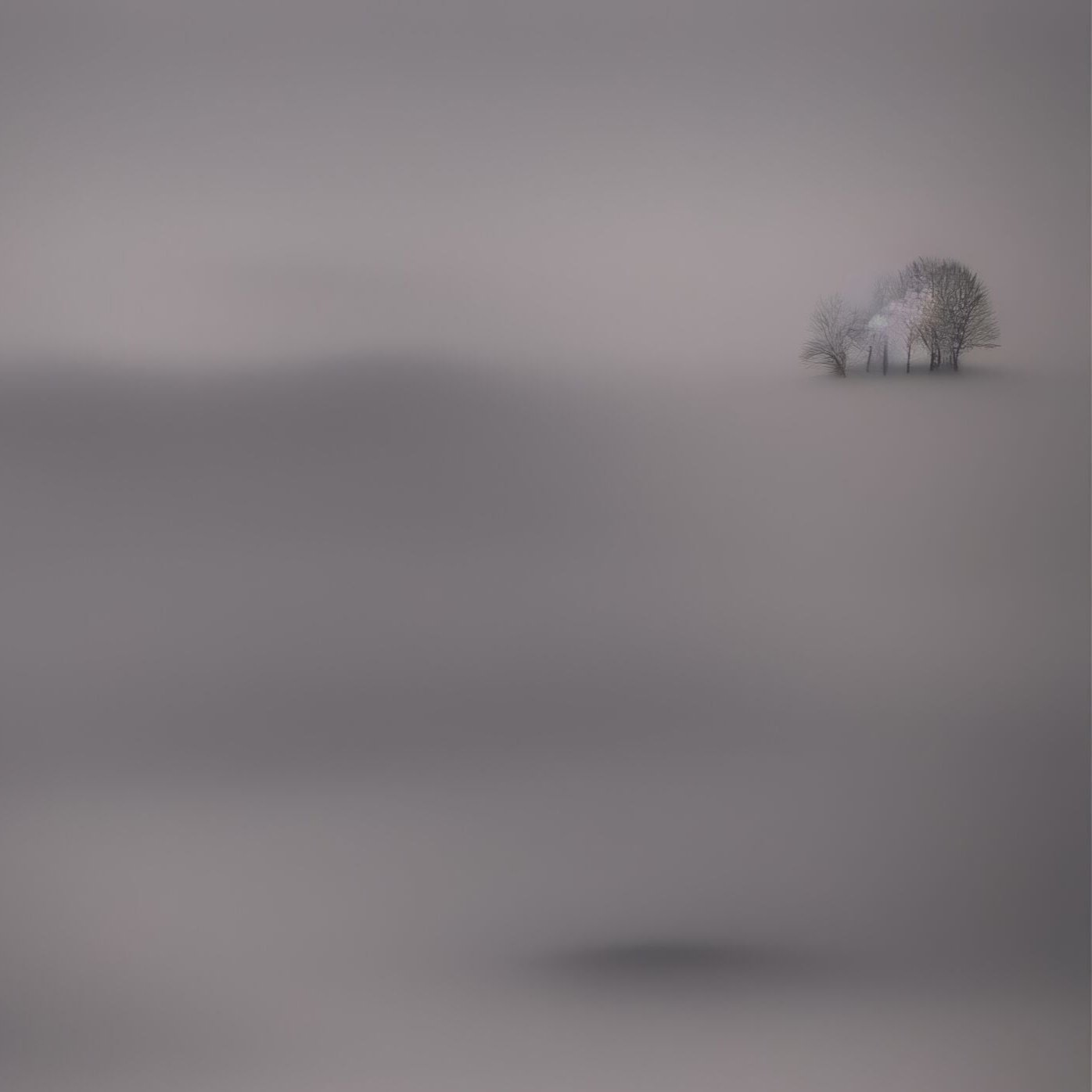 Ethereal Horizons - Pt 1 - Island Of Solitude by Lucas Vale – Giclée Print, 40cm x 61cm, 15.9in x 24.0in, Print Only, placed above a sleek desk in a modern workspace