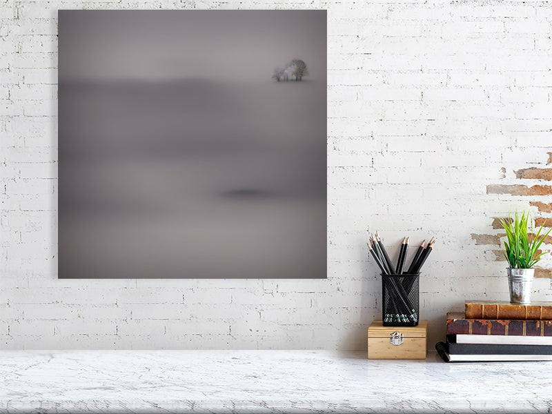 Ethereal Horizons - Pt 1 - Island Of Solitude by Lucas Vale – Giclée Print, 70cm x 100cm, 27.6in x 39.4in, Black Frame, placed above a sleek desk in a modern workspace