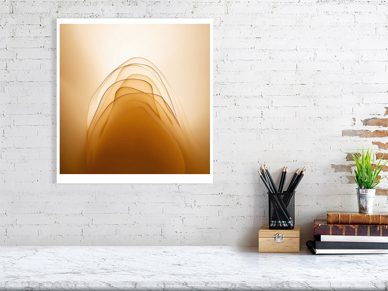 Golden Lumina - Golden Layers by Lucas Vale – Giclée Print, 40cm x 40cm, 15.8in x 15.8in, Black Frame, placed above a sleek desk in a modern workspace