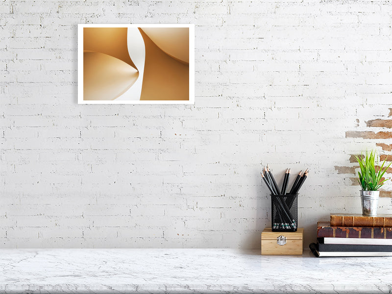 Golden Lumina - Golden Aperture by Lucas Vale – Giclée Print, 60cm x 83cm, 23.8in x 32.7in, Print Only, placed above a sleek desk in a modern workspace